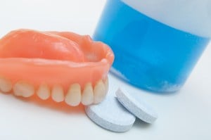 Photo: Full upper dentures and care products