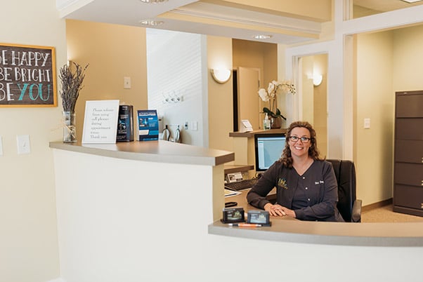 Interior Photo: Receptionist at front desk for Durham NC Dental Practice