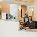 Interior Photo: Receptionist at front desk for Durham NC Dental Practice