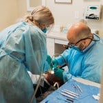 Photo: Durham NC Dentist Dr. Reinaldo Lasanta-García, DMD, works with a patient