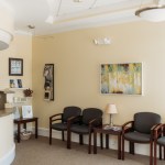 Photo: Dental patient waiting room and reception desk in Durham NC